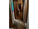 Long hallway featuring original hardwood floors at 603 New Hope Rd, Fayetteville, GA 30214