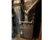 Heating unit showing mechanical components and utility access at 603 New Hope Rd, Fayetteville, GA 30214