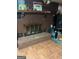 Cozy living room featuring a classic brick fireplace at 603 New Hope Rd, Fayetteville, GA 30214