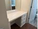 Bathroom vanity featuring a white countertop with storage drawers at 6190 Douglas Manor Ct, Douglasville, GA 30134