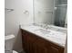 Modern bathroom vanity featuring a white countertop and wood cabinetry at 6190 Douglas Manor Ct, Douglasville, GA 30134
