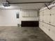 Spacious garage features large cabinets and storage space at 6190 Douglas Manor Ct, Douglasville, GA 30134
