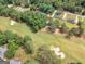 Find your dream home in this aerial view of tree-lined streets near the neighborhood golf course at 1585 Lake Dow Rd, Mcdonough, GA 30252