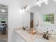 Bathroom featuring double sinks, granite countertops, a mirror, and an attached bedroom at 1585 Lake Dow Rd, Mcdonough, GA 30252