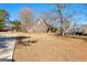 Lovely exterior view of home with basketball hoop and driveway at 1585 Lake Dow Rd, Mcdonough, GA 30252