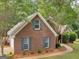 Brick house showing front yard and landscaping at 1585 Lake Dow Rd, Mcdonough, GA 30252