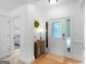 Bright entryway featuring hardwood floors, fresh white paint and a decorative front door at 1585 Lake Dow Rd, Mcdonough, GA 30252