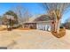 Exterior view of the two-car garage and driveway at 1585 Lake Dow Rd, Mcdonough, GA 30252