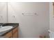 Simple half bathroom featuring a single sink and a towel bar at 96 Ashtonbrook Dr, Mcdonough, GA 30252