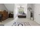 Well-lit bedroom featuring a large window and decorative accents at 96 Ashtonbrook Dr, Mcdonough, GA 30252