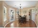 Cozy dining area featuring a window and access to the laundry room at 96 Ashtonbrook Dr, Mcdonough, GA 30252