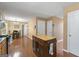 Open-concept kitchen with a center island and a view of the dining area at 96 Ashtonbrook Dr, Mcdonough, GA 30252