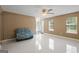 Inviting living room with tile floors and natural light streaming through the windows at 96 Ashtonbrook Dr, Mcdonough, GA 30252