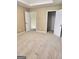 Spacious carpeted bedroom with neutral walls and multiple doorways, offering versatility at 1441 Saint George Pl, Conyers, GA 30012