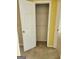 This closet has white wire shelving, a white door and beige carpet at 1441 Saint George Pl, Conyers, GA 30012