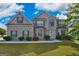 Beautiful two-story home featuring a brick facade, well-manicured lawn, and a welcoming front entrance at 1441 Saint George Pl, Conyers, GA 30012
