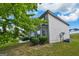 Traditional-style home boasts well-maintained landscaping, and mature trees providing shade and curb appeal at 1441 Saint George Pl, Conyers, GA 30012
