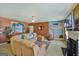 Cozy living room with comfortable sectional sofa, and a large TV at 1441 Saint George Pl, Conyers, GA 30012