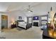Comfortable main bedroom with a fireplace, vaulted ceilings, and a ceiling fan at 1441 Saint George Pl, Conyers, GA 30012