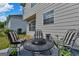Outdoor seating area with a table and chairs, ideal for entertaining guests at 1441 Saint George Pl, Conyers, GA 30012