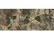Aerial view showcasing the property's boundaries and surrounding landscape at 1627 Leguin Mill Rd, Locust Grove, GA 30248
