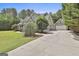Exterior view of home with attached garage and long driveway at 465 Crabapple Rd, Fayetteville, GA 30215