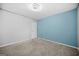 Bright bedroom features plush carpeting, textured ceiling, and ample natural light at 2511 Due West Nw Cir, Kennesaw, GA 30152