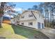 Inviting two-story home with a two-car garage, landscaped yard, and beautiful architectural details at 2511 Due West Nw Cir, Kennesaw, GA 30152