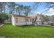 Well-maintained front yard featuring a charming home with a combination of siding and brick details at 2511 Due West Nw Cir, Kennesaw, GA 30152