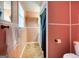 A cozy bathroom featuring peach colored walls and neutral floor tiles at 428 Cornish Mountain Rd, Oxford, GA 30054