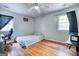 Bedroom with wooden floors and two windows at 428 Cornish Mountain Rd, Oxford, GA 30054