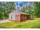 Brick home exterior with large yard and inviting covered porch at 428 Cornish Mountain Rd, Oxford, GA 30054