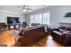Living room with hardwood floors and large windows at 428 Cornish Mountain Rd, Oxford, GA 30054