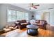 Comfortable living room showcases hardwood floors and plentiful natural light at 428 Cornish Mountain Rd, Oxford, GA 30054