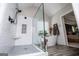 Bathroom boasts tile shower with glass surround and standalone tub at 125 High Bluff Trl, Carrollton, GA 30116