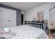 Bright bedroom with white walls, plush carpet, and a cozy hammock swing for relaxation at 125 High Bluff Trl, Carrollton, GA 30116