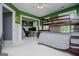 Green bedroom with bunk beds and a desk area at 125 High Bluff Trl, Carrollton, GA 30116