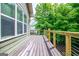 Decking with nice metal and wood railings at 125 High Bluff Trl, Carrollton, GA 30116