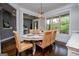 Dining room offers a window view, natural light, and transitional flow with adjacent rooms at 125 High Bluff Trl, Carrollton, GA 30116