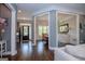 The light filled foyer flows into the dining room and living room, showcasing the home's open layout at 125 High Bluff Trl, Carrollton, GA 30116