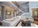 Spacious living room features two-story ceiling and a staircase to second level at 125 High Bluff Trl, Carrollton, GA 30116