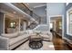 Comfortable living room with staircase and foyer views, offers an inviting and open atmosphere at 125 High Bluff Trl, Carrollton, GA 30116
