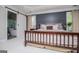 Spacious primary bedroom featuring a decorative wall, barn door to ensuite, and lots of natural light at 125 High Bluff Trl, Carrollton, GA 30116