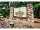 Stone signage with landscaping and lighting at 125 High Bluff Trl, Carrollton, GA 30116