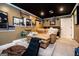 A home theater with tiered seating and a projector screen, perfect for movie nights at 125 High Bluff Trl, Carrollton, GA 30116