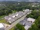 Aerial view showing the community's layout, surrounded by mature trees and landscaping at 2108 Remy Ct, Kennesaw, GA 30144