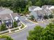 A serene aerial view of well-placed townhomes surrounded by trees at 2108 Remy Ct, Kennesaw, GA 30144