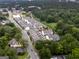 An aerial view of the neighborhood, displaying the community's layout amid lush trees at 2108 Remy Ct, Kennesaw, GA 30144