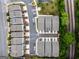 An aerial view of well-maintained townhomes and parking spaces in a community at 2108 Remy Ct, Kennesaw, GA 30144