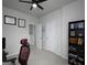 Carpeted bedroom with a ceiling fan and a black bookshelf at 2108 Remy Ct, Kennesaw, GA 30144